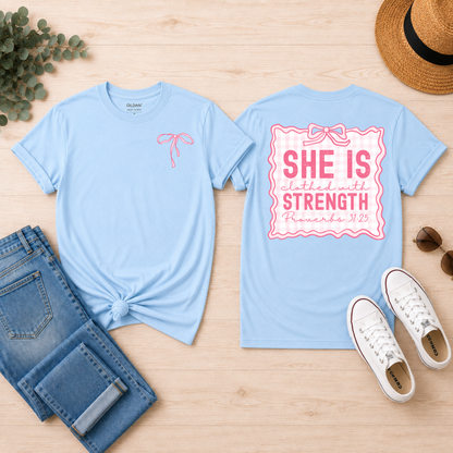 She Is Clothed in Strength Coquette Bow Graphic Tee - Adult